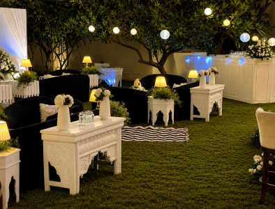 White modern dessert bar and illuminated cocktail installation
